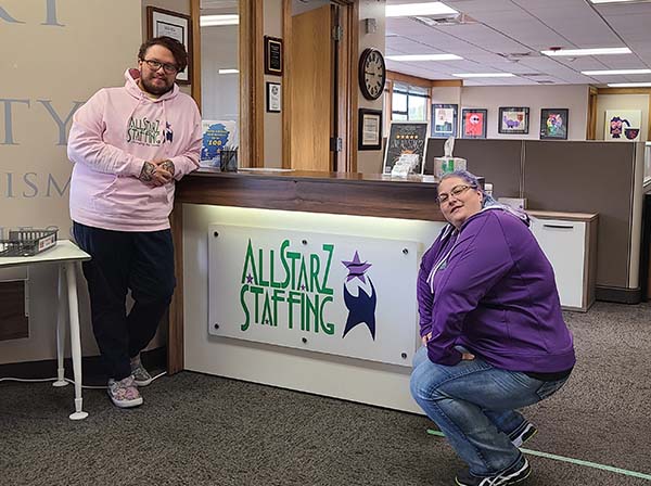 Our Recruiting Coordinator, Angel and Recruiter, Lindsey at the front desk at the flagship branch of All StarZ Staffing in Tukwila, WA