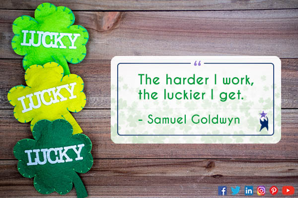 Image shows 3 felt, green shamrocks on the left over a wood background. Each has white text that says "Lucky". Text reads: "The harder I work, the luckier I get." - Samuel Goldwyn.