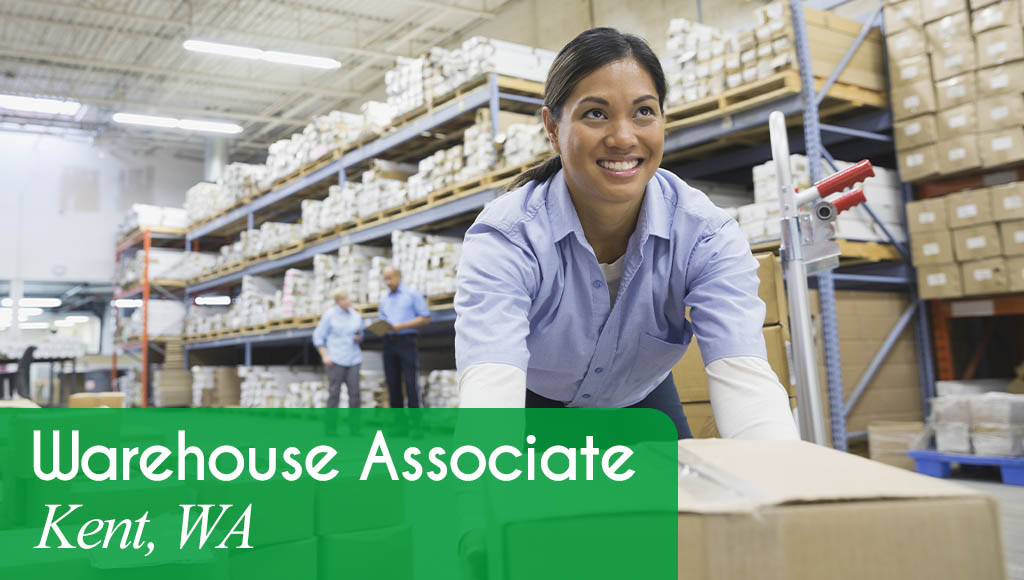 Image shows a smiling woman with a box in a warehouse. Now Hiring a Warehouse Associate in Kent, WA.