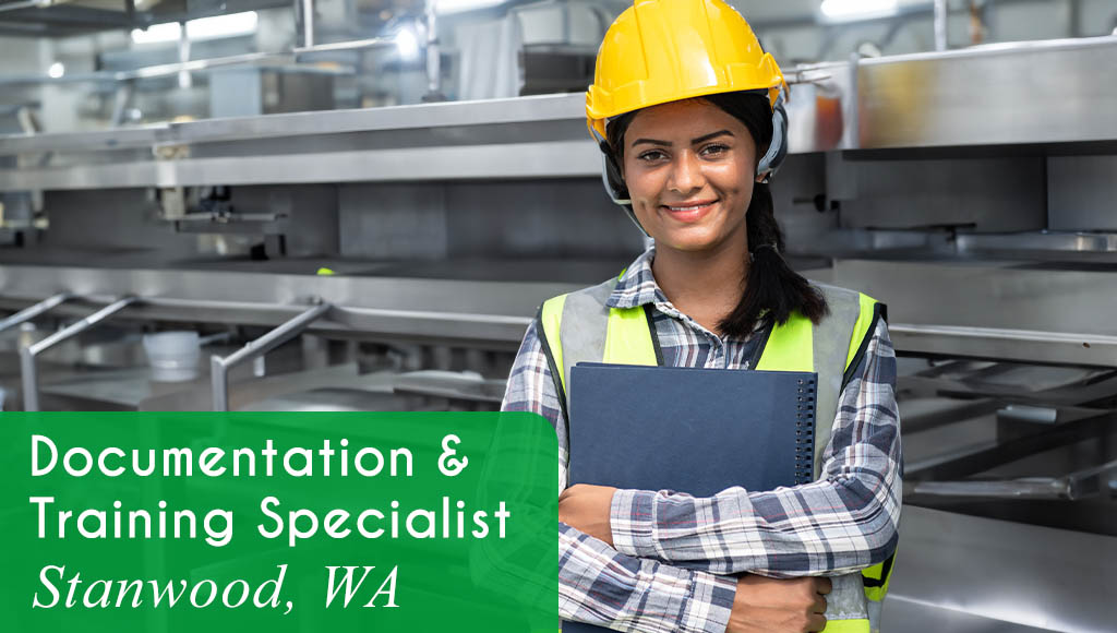 Image shows a woman with holding a clipboard in a food production facility. Text reads: Now hiring a Documentation Training Specialist in Stanwood, WA. All StarZ Staffing.